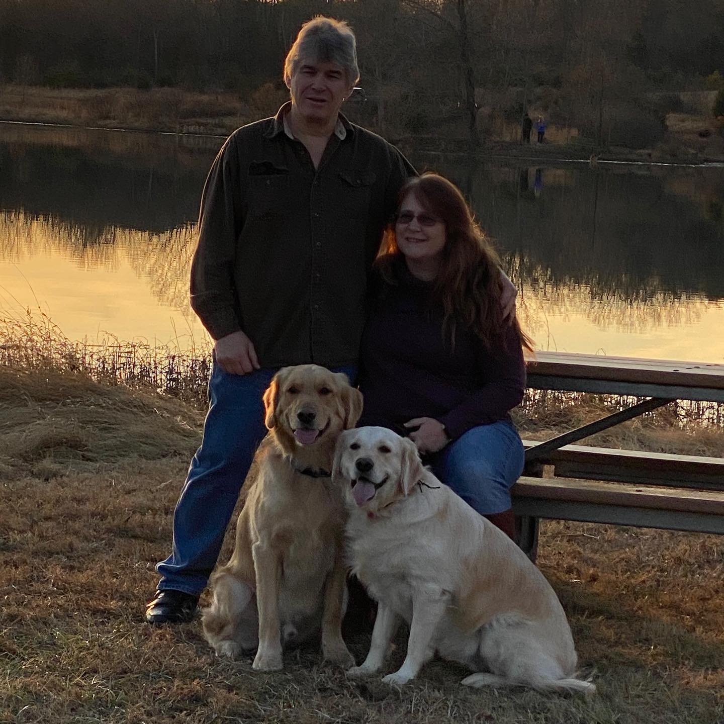 Jason and Tiffani Graves with Golden Retrievers